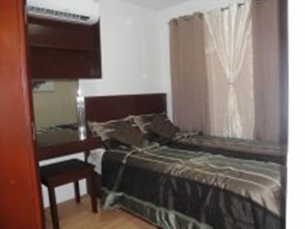 The Oasis Davao Condotel Værelse billede