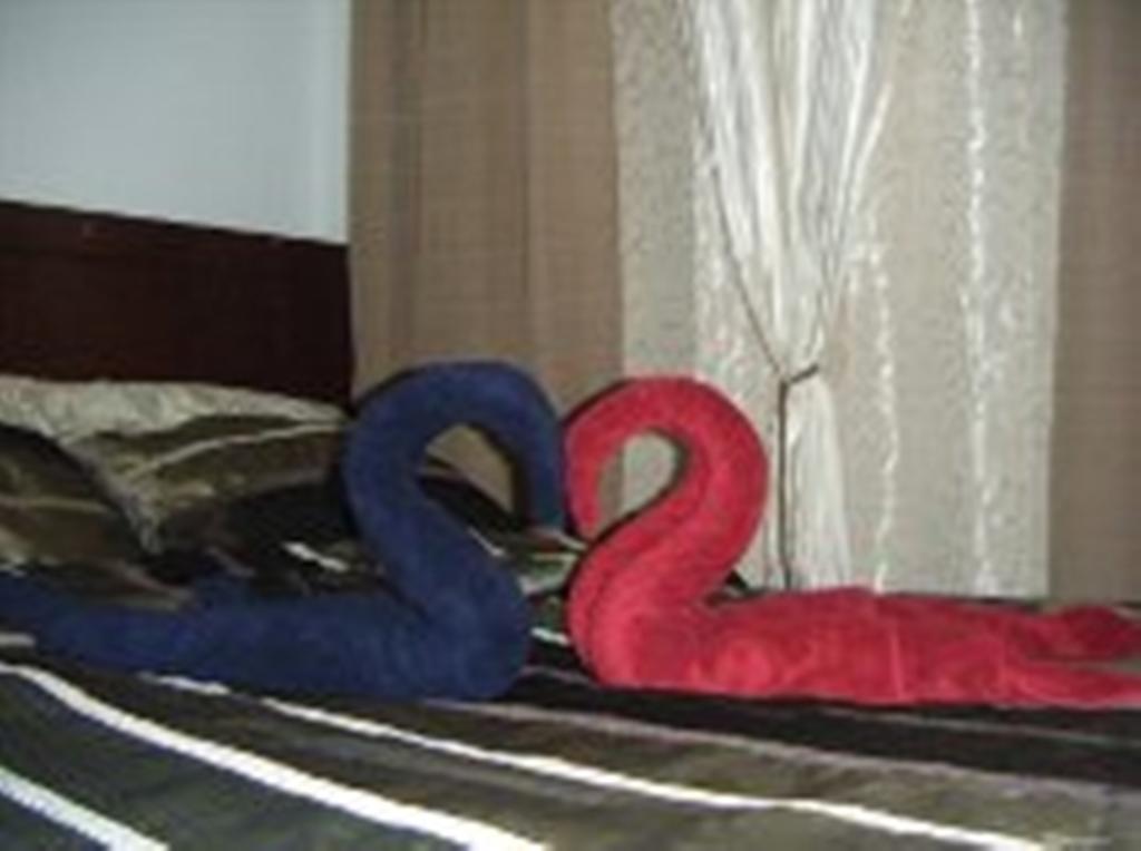 The Oasis Davao Condotel Værelse billede